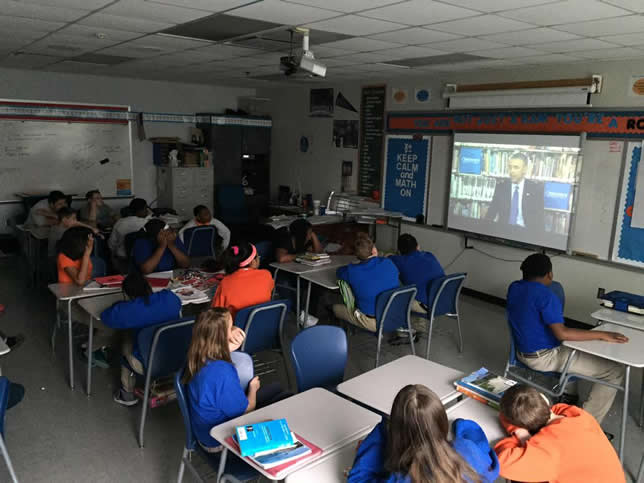 Students participate in a virtual field trip from Discover Education featuring President Obama.