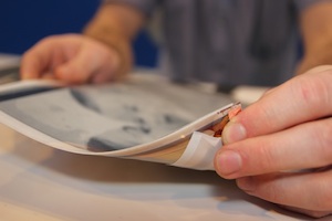 The PaperTab is a thin, flexible, tablet-like device running on an Intel Core i5 processor.