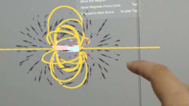 Wearing headsets, students can visualize how the magnetic field works in two or three dimensions by manipulating virtual bar magnets with their fingers and watching how compass needles respond to this invisible phenomenon.
