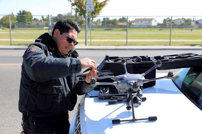 School District Safety Officer Ricardo Lemus operates a drone at Delhi Unified. Photo by Nate Gomes, courtesy of the Merced County Office of Education