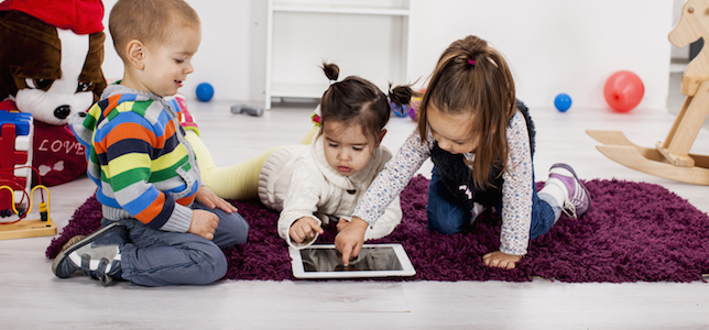 preschoolers using a tablet