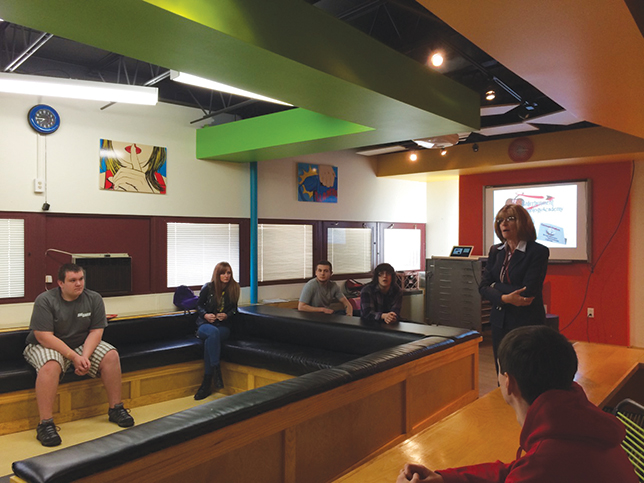 Mathematics teacher Mary Wilson talks to students about the Situated Multimedia Arts Learning Lab (SMALLab) in Elizabeth Forward Middle School. The lab was equipped using funds from a $20,000 grant to the district from the Allegheny Intermediate Unit.