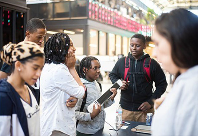 Students engaging in HE³AT program