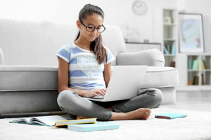 kid using laptop