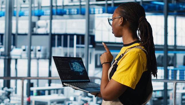 worker using AI on laptop