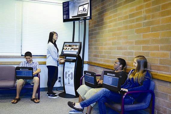 students at kent school district washington using internet kiosks after school