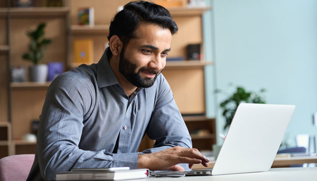 teacher using laptop