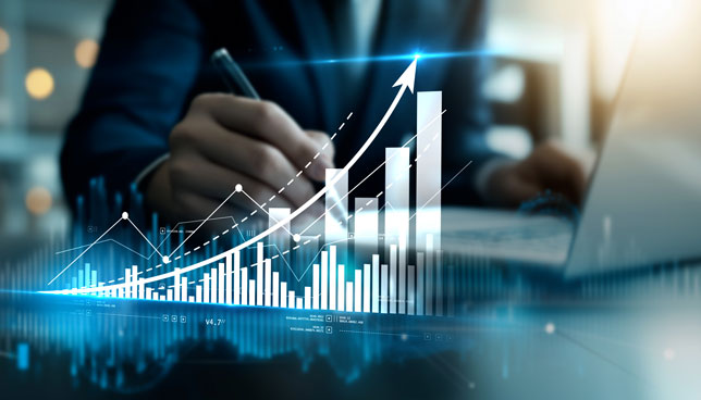 Businessman using laptop analyzing data and growth graph chart