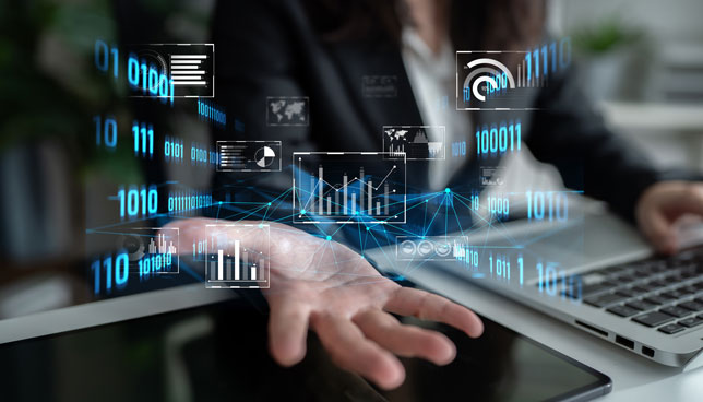hand outstretched toward holographic data dashboard