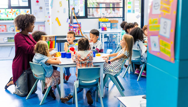 Diverse classroom with children and a teacher