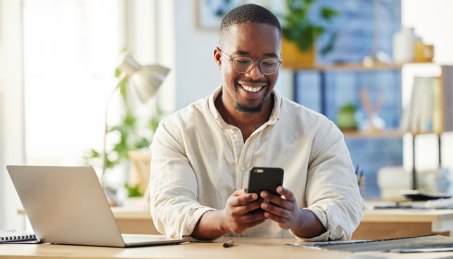 business man using smart phone in office