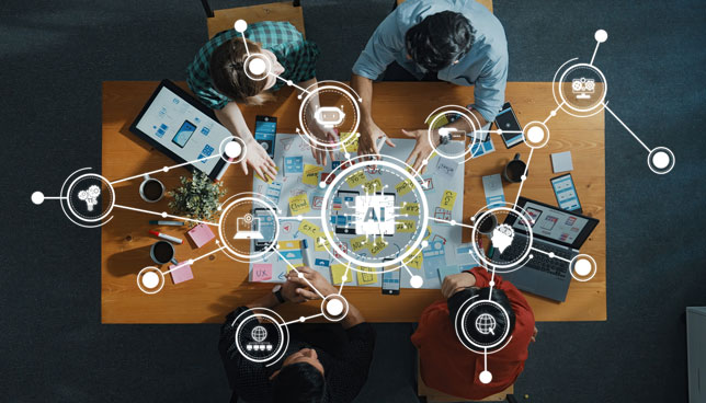 top-down view of a collaborative team working on AI technology development 