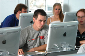 picture of a classroom, students at computers