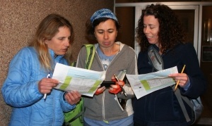 Tech Search Party participants puzzle over a clue.